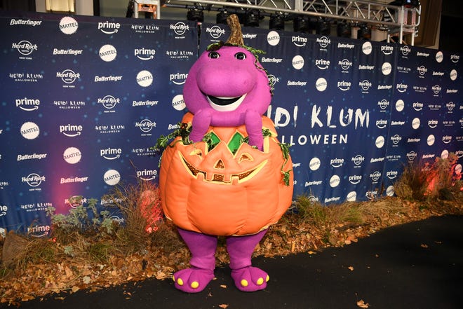 Barney The Dinosaur attends Heidi Klum's 23rd annual Halloween party — presented by Butterfinger, Mattel, and Prime Video — at The Venue on Music Row on Oct. 31, 2024, in New York City.