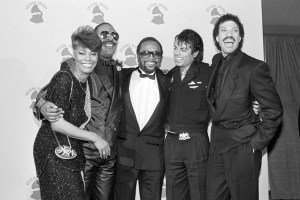 Dionne Warwick, Stevie Wonder, Quincy Jones, Michael Jackson, and Lionel Richie congratualate each other after "We Are The World" won 4 Grammy Awards.