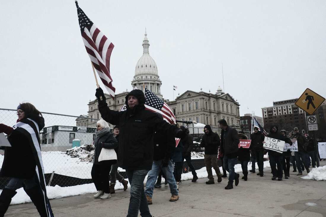 Jan. 6, 2021: Then-President Trump's supporters march at the Michigan State Capitol to protest the certification of Joe Biden as the next U.S. president.