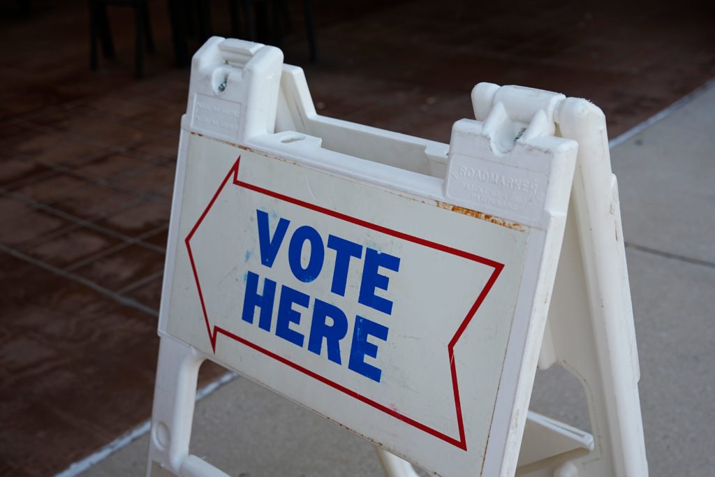 A voting sign is pictured during voting at The Shoppes at Northpark in Oklahoma City, Tuesday, Aug., 27, 2024.