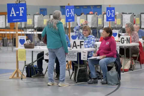 Faith Ninivaggi/Reuters People vote at Longley Elementary School in Maine's 2nd congressional district on Election Day in Lewiston, Maine, 5 November 2024 