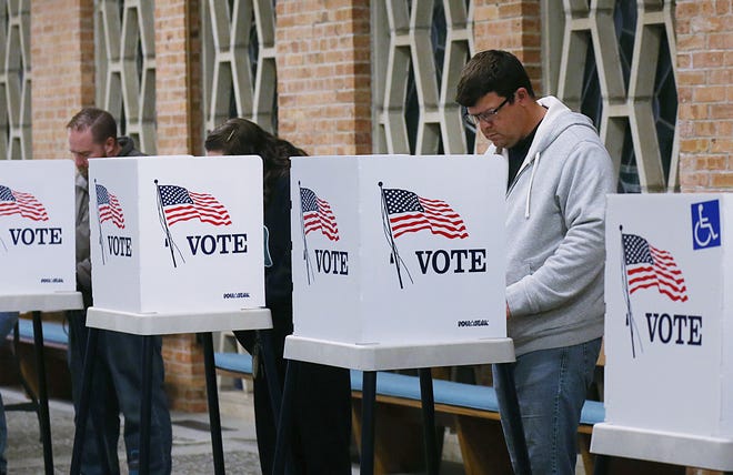 Voters cast their votes in the presidential election at Bethesda Lutheran Church on Northwestern Avenue on Tuesday Nov. 5, 2024, in Ames, Iowa.