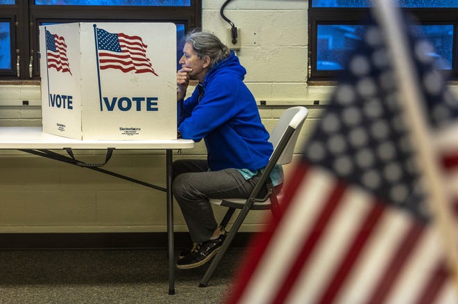 Katie Boggs casts her vote as she does every election at Stevens Point Police Department in Stevens Point, Wis. in the afternoon on Election Day, Tuesday, Nov 5, 2024.