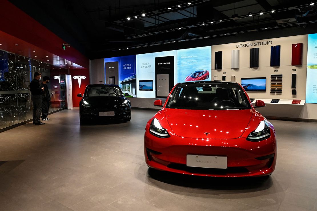 Tesla Model 3 cars are seen at a Tesla showroom at a shopping mall in Beijing on April 29, 2022.