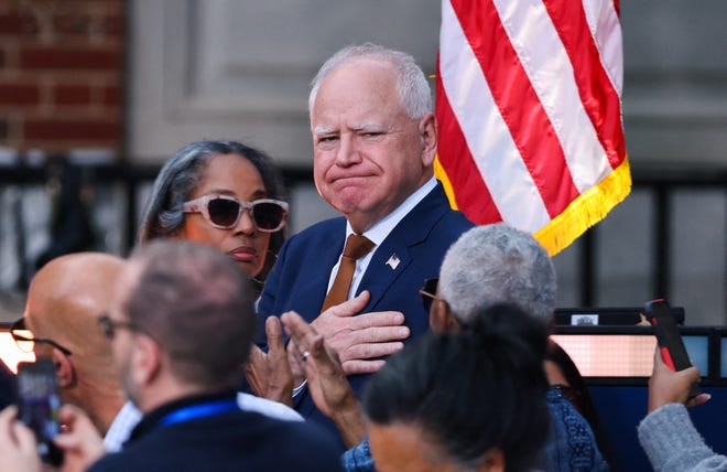 Democratic vice presidential nominee Minnesota Governor Tim Walz gestures as he arrives to listen Democratic presidential nominee U.S. Vice President Kamala Harris remarks, conceding 2024 U.S. presidential election to President-elect Donald Trump, at Howard University in Washington, U.S., November 6, 2024.