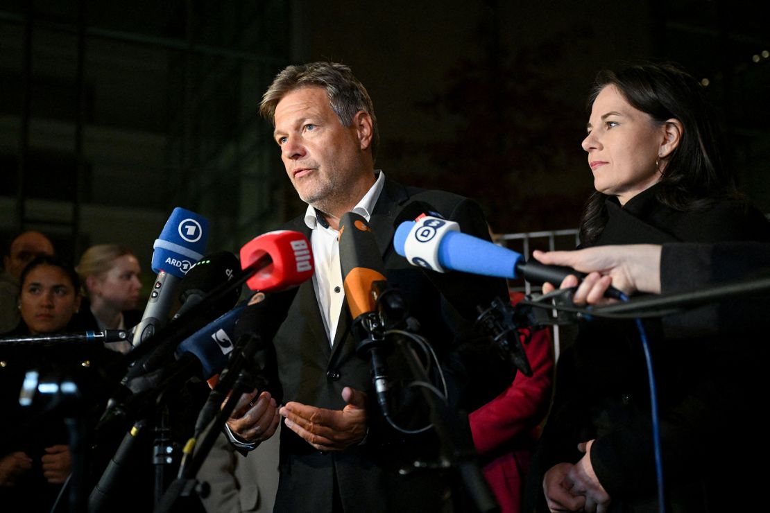 Robert Habeck and Annalena Baerbock of the Greens address media on Wednesday.