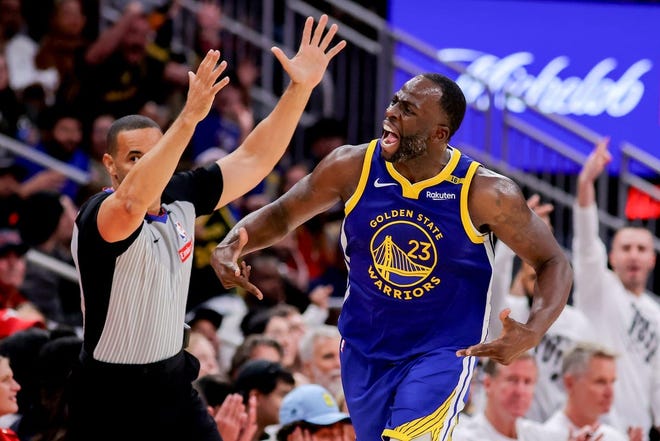 Golden State Warriors forward Draymond Green (23) reacts after a made basket against the Houston Rockets during the fourth quarter at Toyota Center. Mandatory Credit: Erik Williams-Imagn Images