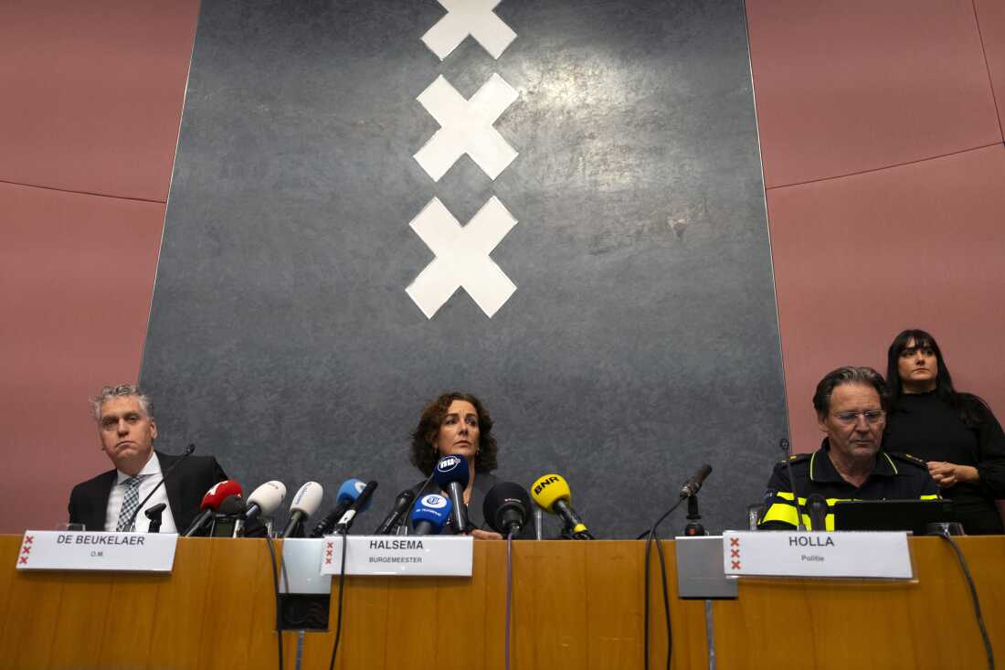 Amsterdam's Mayor Femke Halsema (center), acting Amsterdam police chief Peter Holla (left) and head of the Amsterdam public prosecutor's office René De Beukelaer hold a news conference after Israeli fans and protesters clashed overnight after a soccer match, in Amsterdam, Netherlands, Friday.