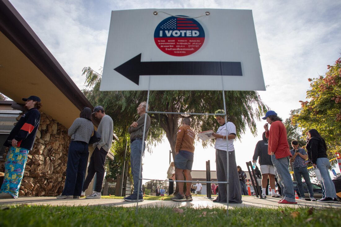 People stand in line to vote at Joslyn Park vote center in Santa Monica, California on Tuesday.