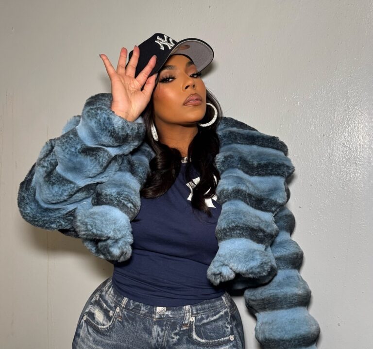 Ashanti-Sang-the-National-Anthem-at-Yankee-Stadium-Wearing-a-Daniels-Leather-Faux-Fur-Chinchilla-Coat-Rag-Bone-Denim-Leggings-and-Dolce-Gabbana-Boots-IMG_1487.jpg