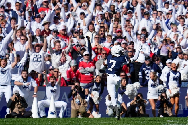 Penn State Nittany Lions cornerback Zion Tracy (7) runs for a touchdown after making an interception during the first half of the NCAA football game against the Ohio State Buckeyes at Beaver Stadium in University Park, Pa. on Saturday, Nov. 2, 2024.