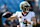 CHARLOTTE, NORTH CAROLINA - NOVEMBER 03: Derek Carr #4 of the New Orleans Saints warms up prior to the game against the Carolina Panthers at Bank of America Stadium on November 03, 2024 in Charlotte, North Carolina. (Photo by Matt Kelley/Getty Images)