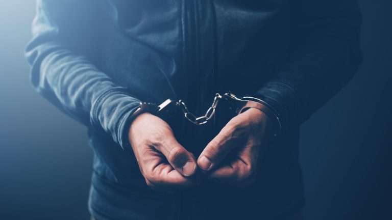 Arrested-computer-hacker-and-cyber-criminal-with-h_1690396703270_1755673182190.jpg